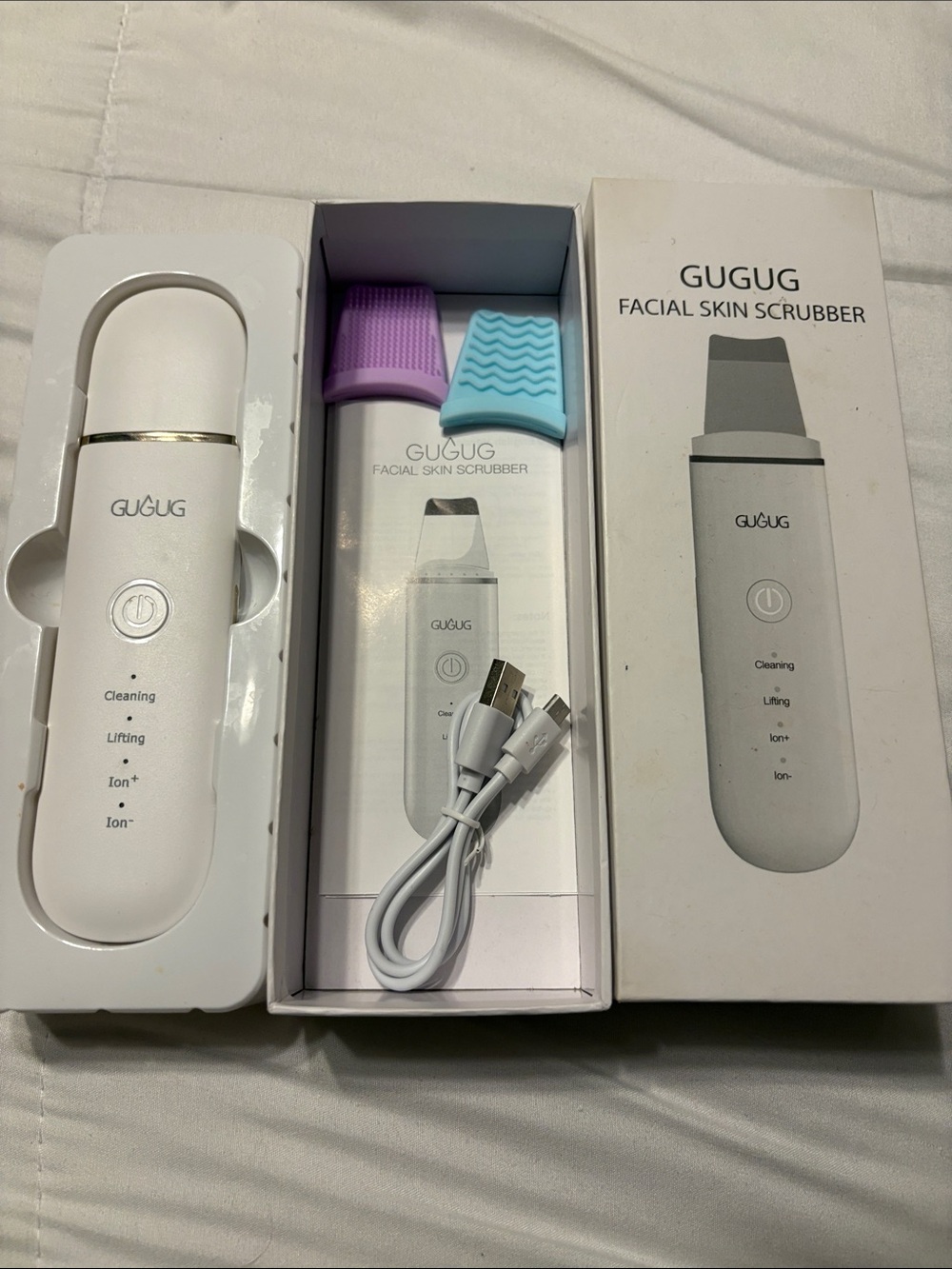 White Ultrasonic Facial Skin Scrubber with Purple & Blue Silicone Heads